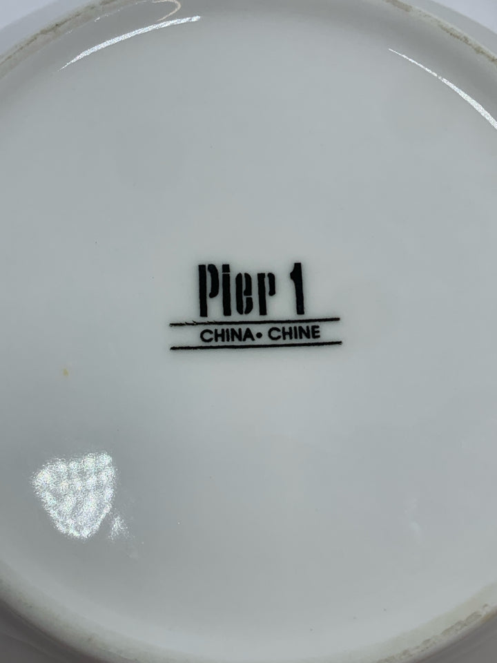 4 CERAMIC NESTING BOWLS.