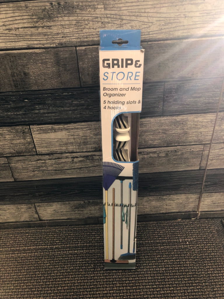 NIB GRIP + STORE BROOM /MOP ORGANIZER.