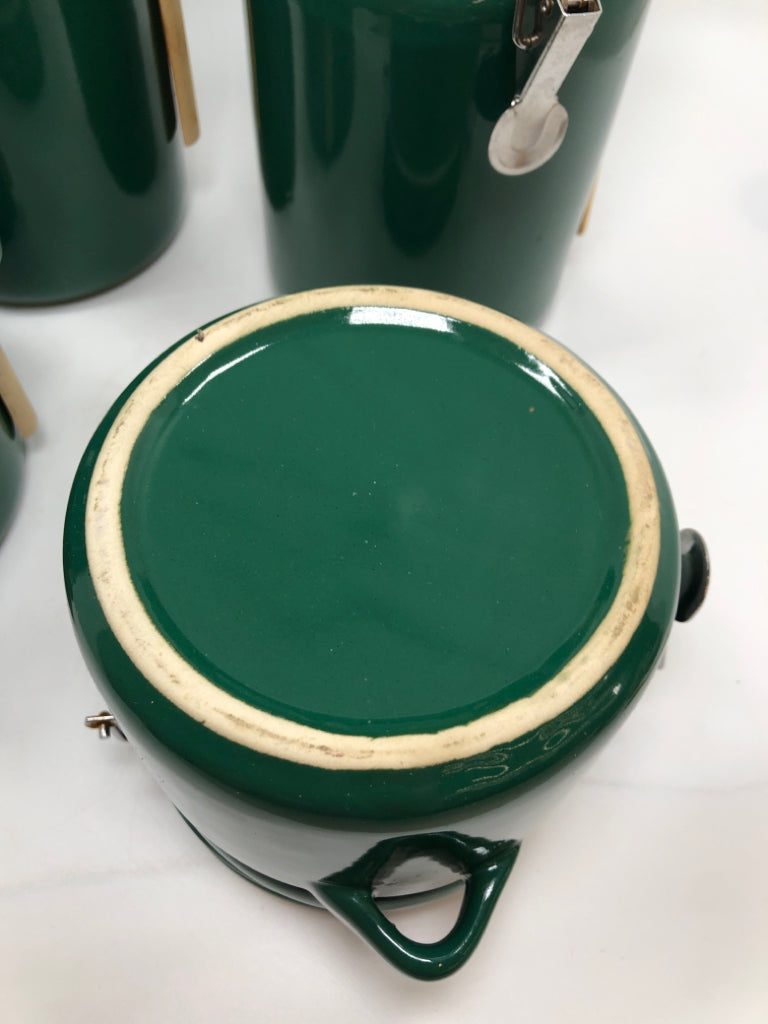 4PC GREEN CANISTERS W/LOCKING LID AND BAMBOO SPOONS.