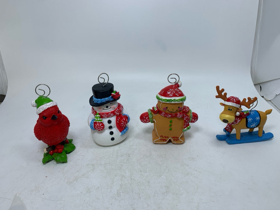 4 RESIN ASSORTED TEMPTATIONS CHARACTERS PHOTO HOLDERS IN BAG.