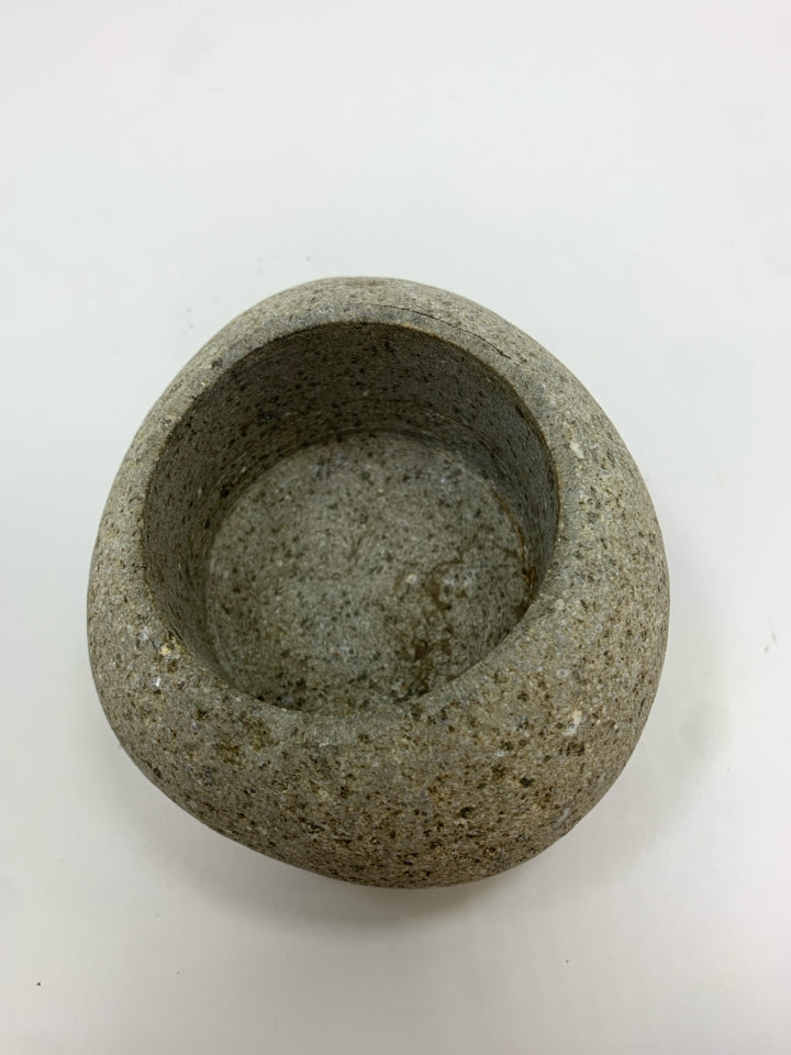 STONE CANDLE HOLDER.