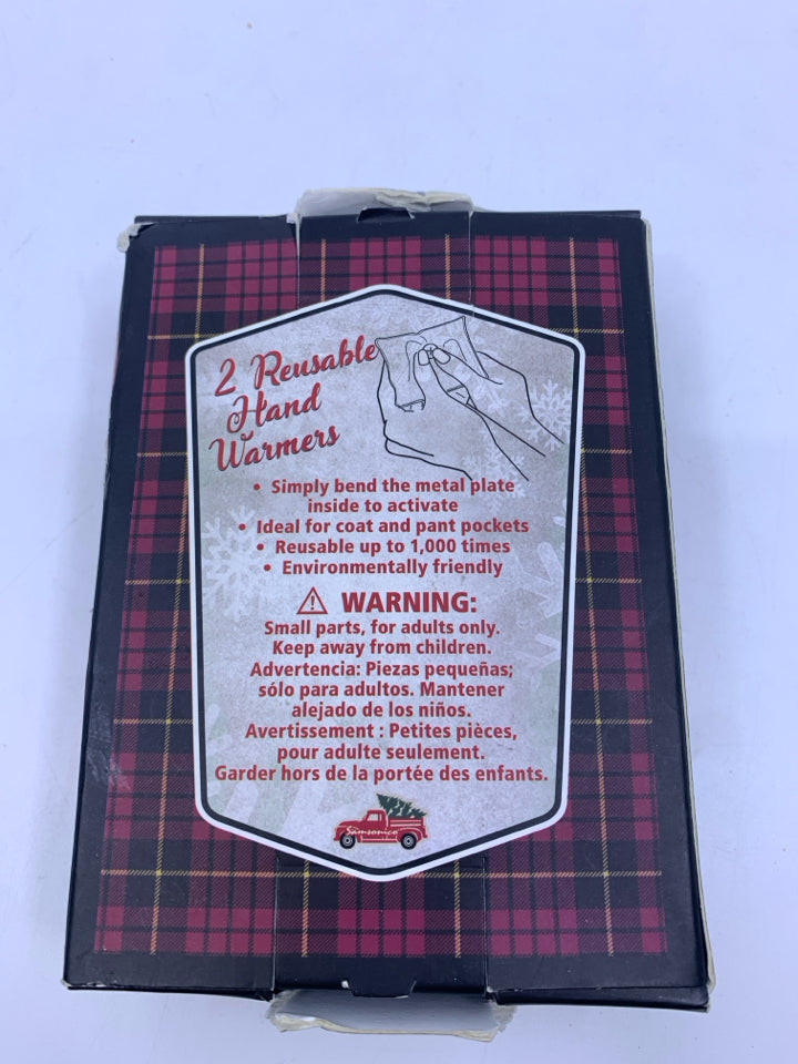 NIB REUSABLE HAND WARMERS.