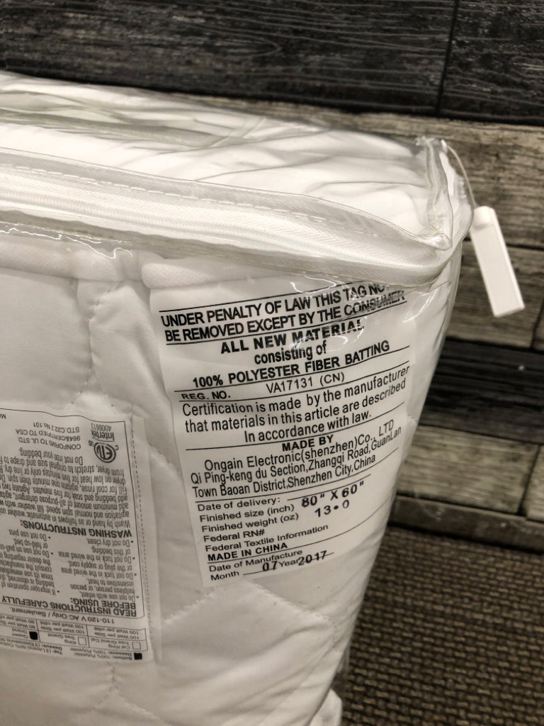 NIP AUTOMATIC HEATED QUEEN MATTRESS PAD.