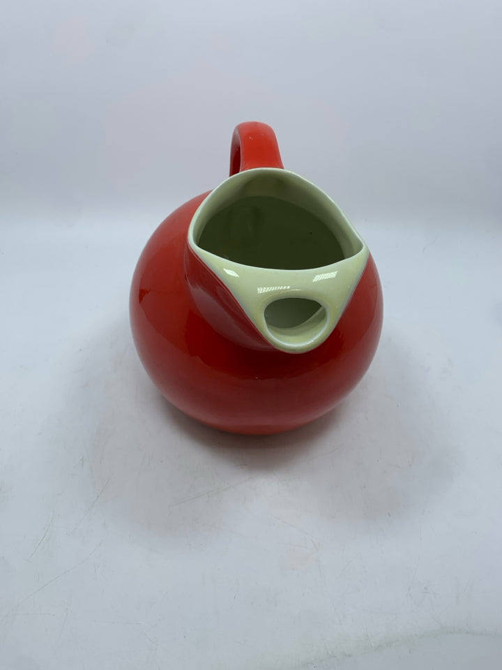 VTG RED CERAMIC PITCHER WITH ICE LIP.