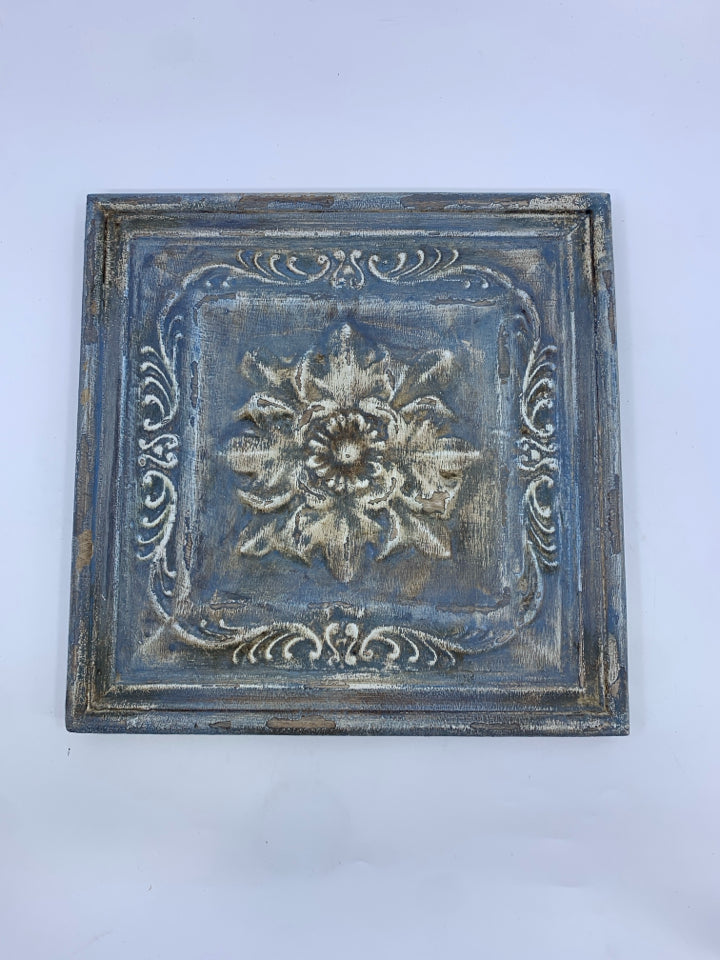 BLUE DISTRESSED SQUARE SCROLL WALL HANGING.