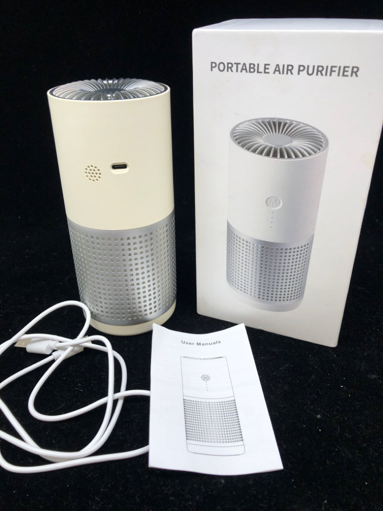 NIB PORTABLE AIR PURIFIER.