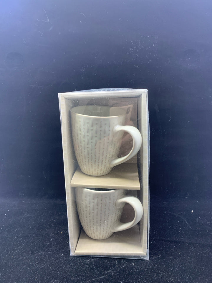 NIB 2 BRANDANI CREAM EMBOSSED MUGS.