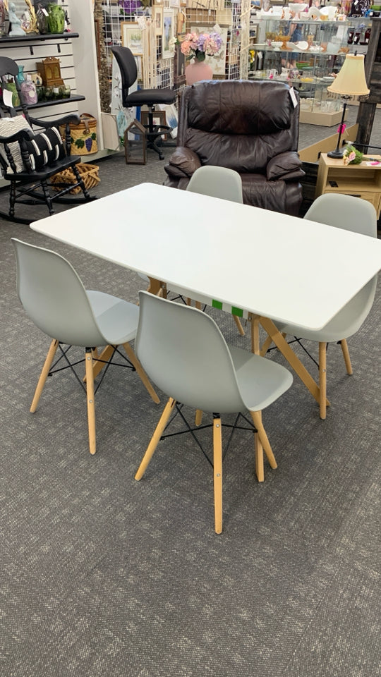 4 CHAIRS + WOOD TABLE W/ANGLED WOOD LEGS.