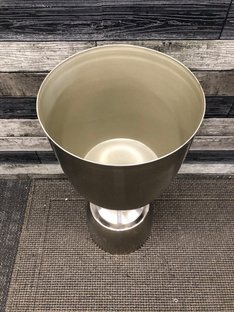 STAINLESS STEEL HOUR GLASS SHAPED PLANTER.