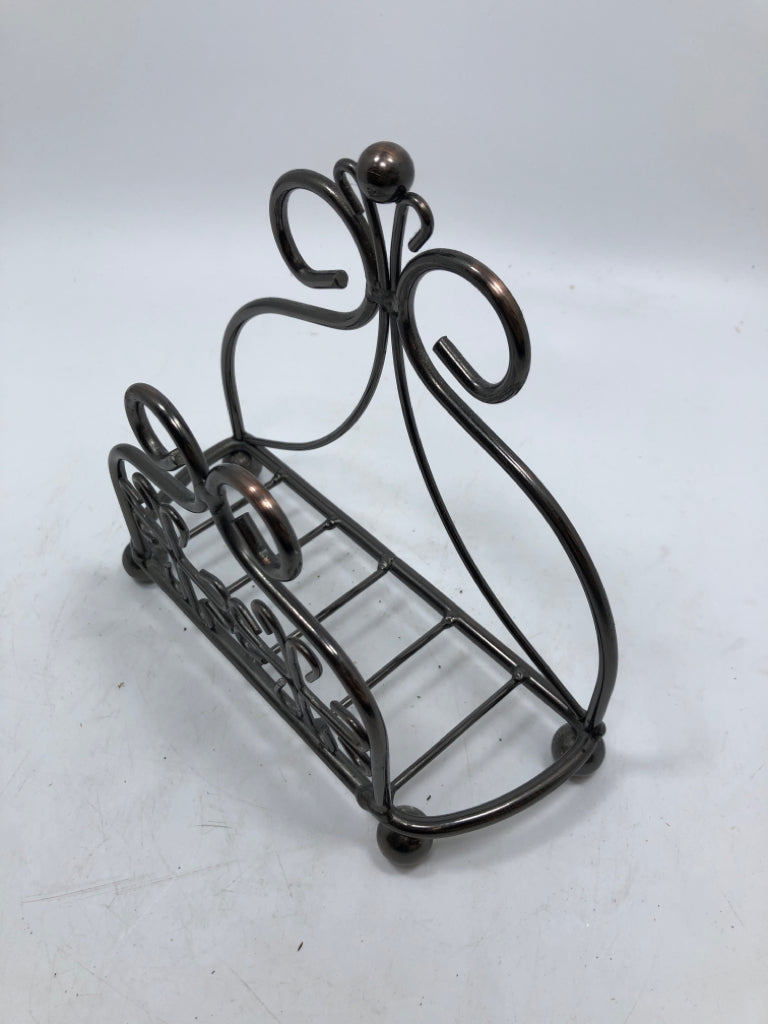 SCROLL METAL NAPKIN HOLDER.