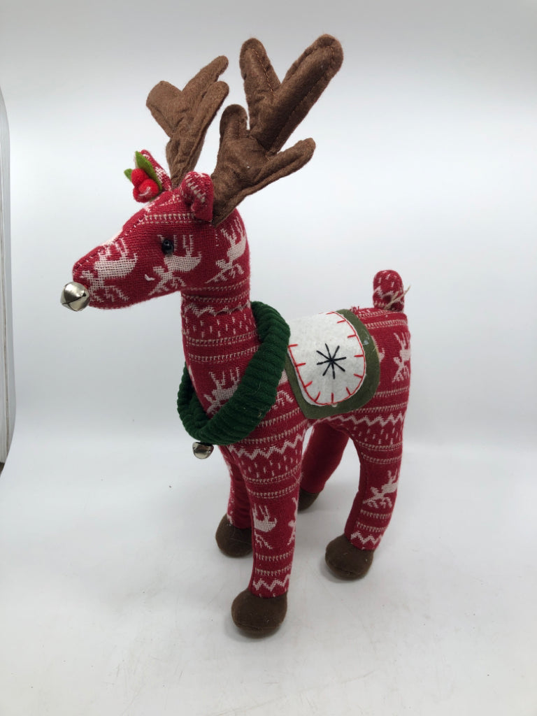 STANDING RED PLUSH REINDEER W/ GREEN COLLARS.
