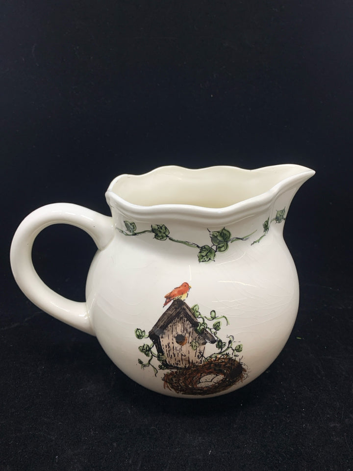 BIRDHOUSE AND NEST PAINTED CERAMIC PITCHER.