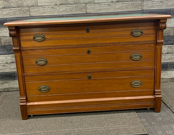 CHERRY WOOD CABINET W 3 DRAWERS AND GREEN MARBLE TOP.