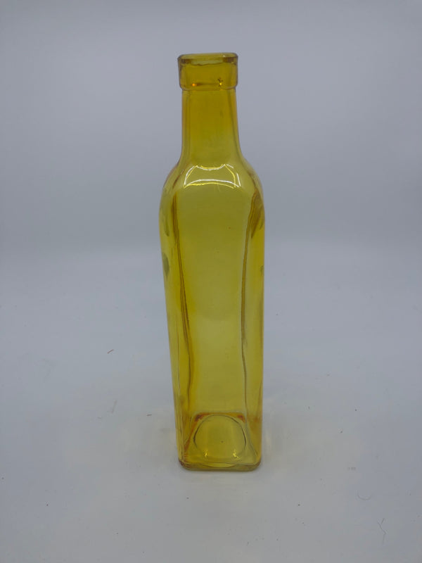 YELLOW GLASS BOTTLE.