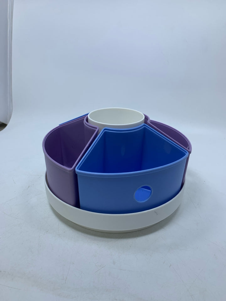 PLASTIC LAZY SUSAN W/ COLORFUL REMOVABLE SLOTS.