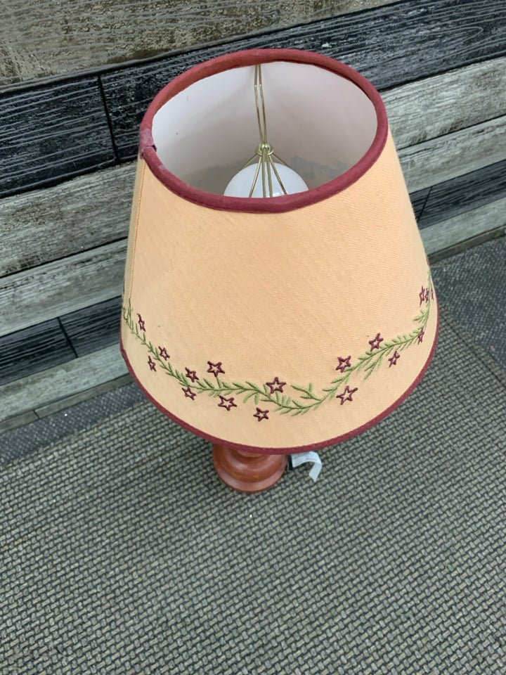 RED PRIMITIVE LAMP.