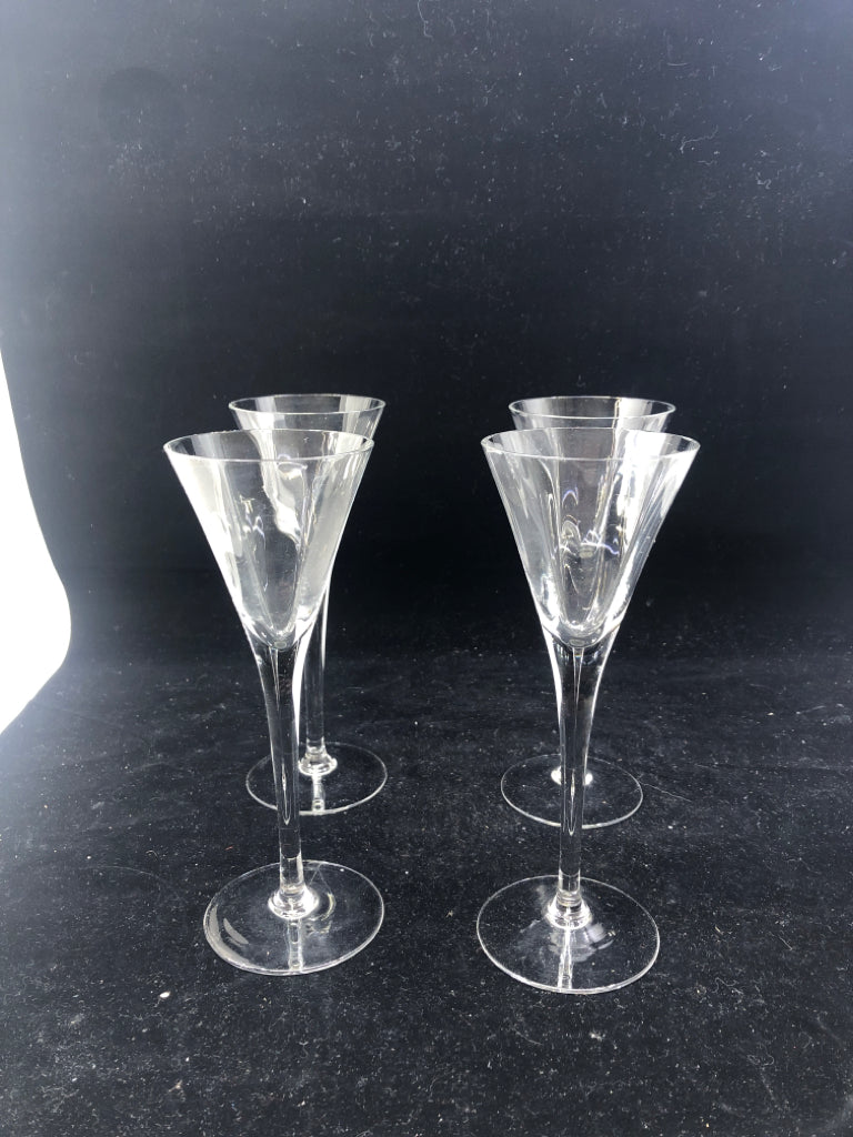 4 CLEAR SMALL FLUTE GLASSES.