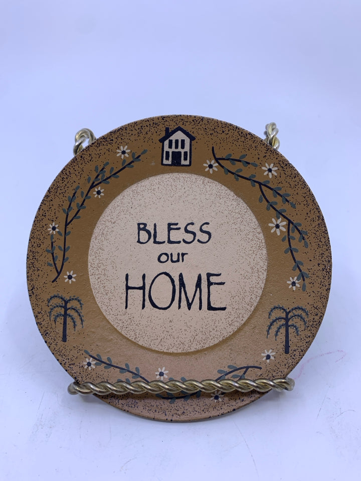 PRIMITIVE "BLESS OUR HOME" TAN ROUND WALL HANGING.