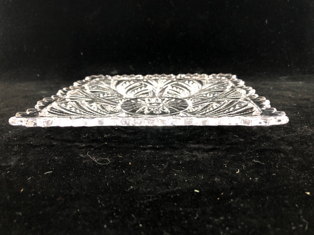CLEAR GLASS EMBOSSED SUN BURST PLATE.