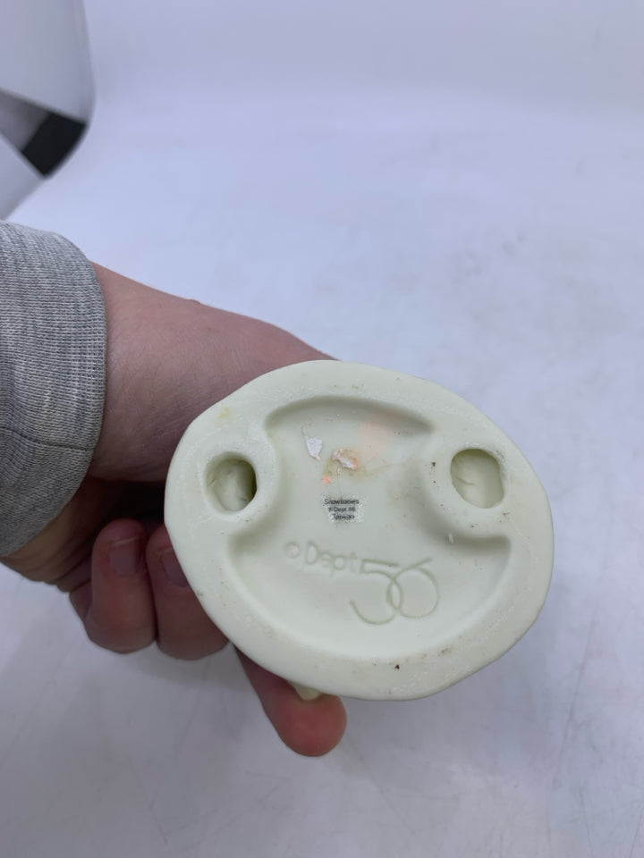 SNOW BABY HOLDING ACCORDION WALKING.