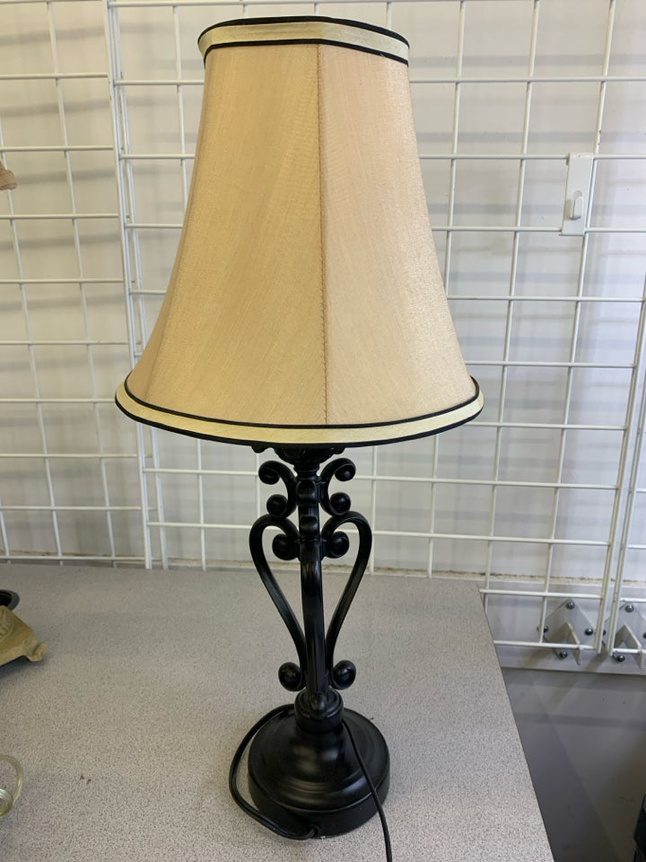 BLACK TABLE LAMP W/CREAM, BLACK STRIPE SHADE.