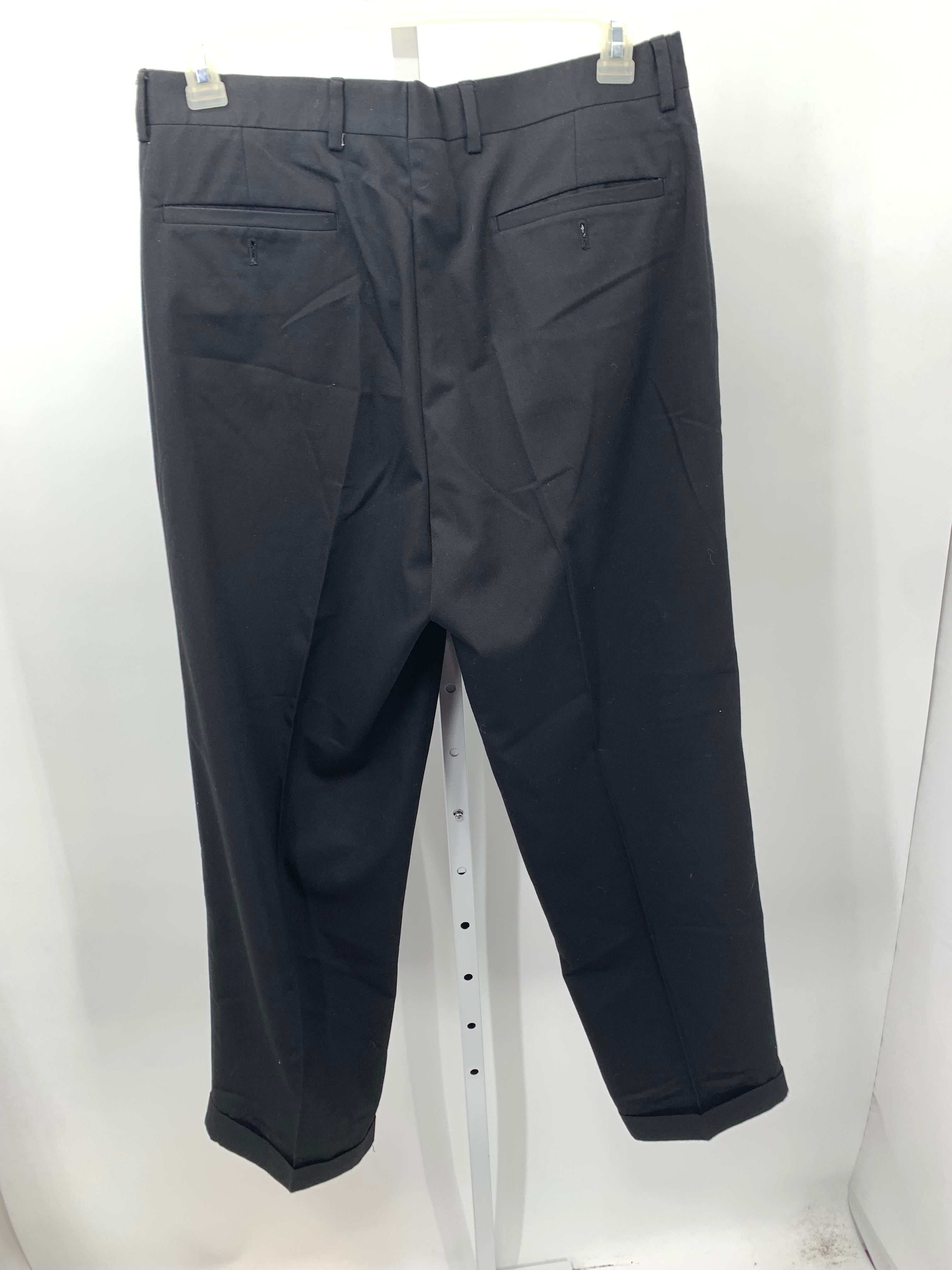 PLEATED FRONT PANTS.