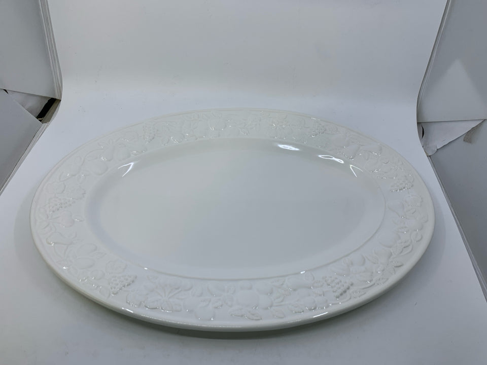 LARGE WHITE OVAL PLANTER W/ EMBOSSED FRUIT ON RIM.