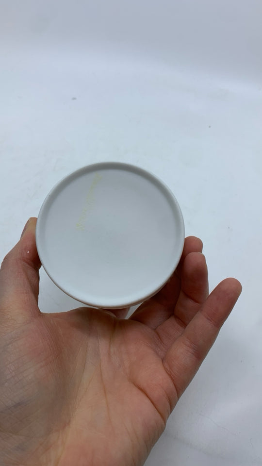 WHITE MATTE CANDLE HOLDER + SAND THEMED CANDLE.