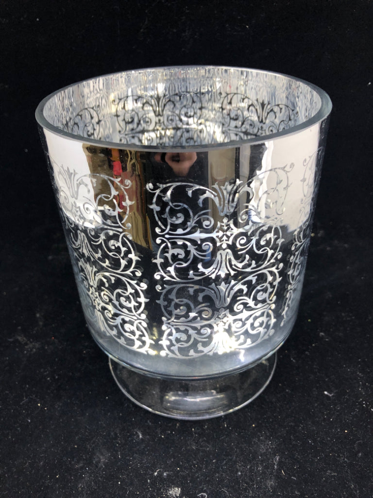 SILVER MERCURY GLASS FOOTED PILLAR CANDLE HOLDER.