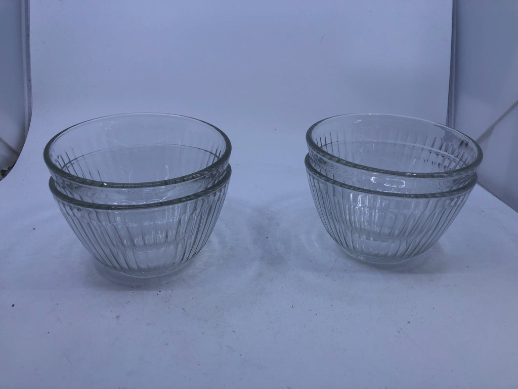 4 RIBBED PYREX BOWLS.