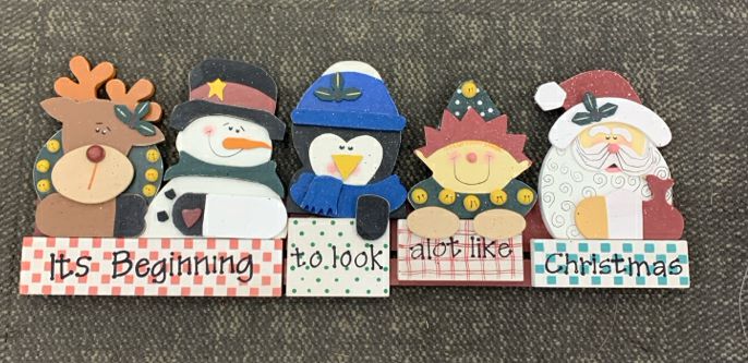 IT'S BEGINING TO LOOK A LOT LIKE CHRISTMAS CHARACTER WOOD SIGN.