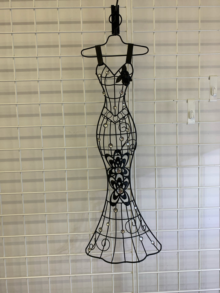 BLACK METAL FORM WHITE CRYSTALS DRESS ON HANGER.