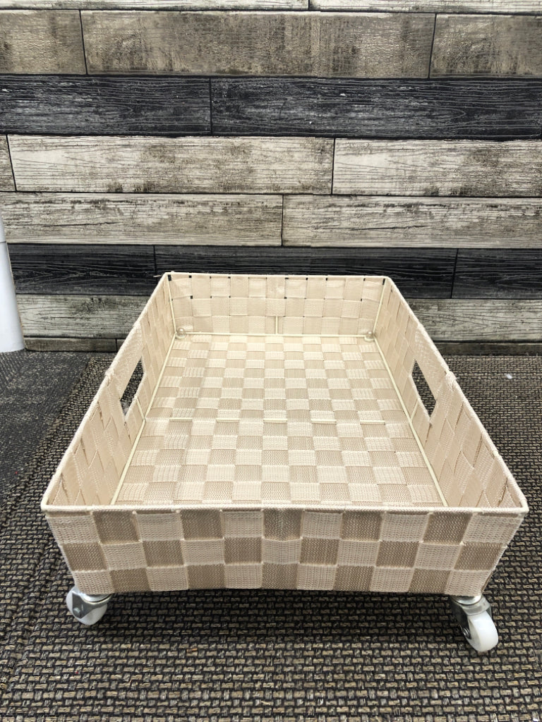 LIGHT ROSE UNDER BED STORAGE W WHEELS.