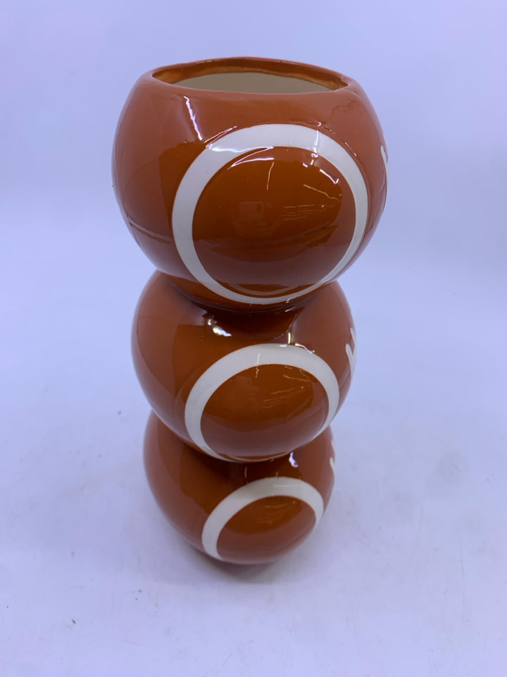 STACKED FOOTBALL CERAMIC VASE.