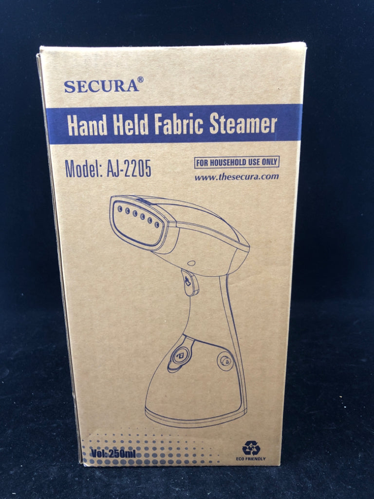NIB HAND HELD FABRIC STEAMER SECURA.