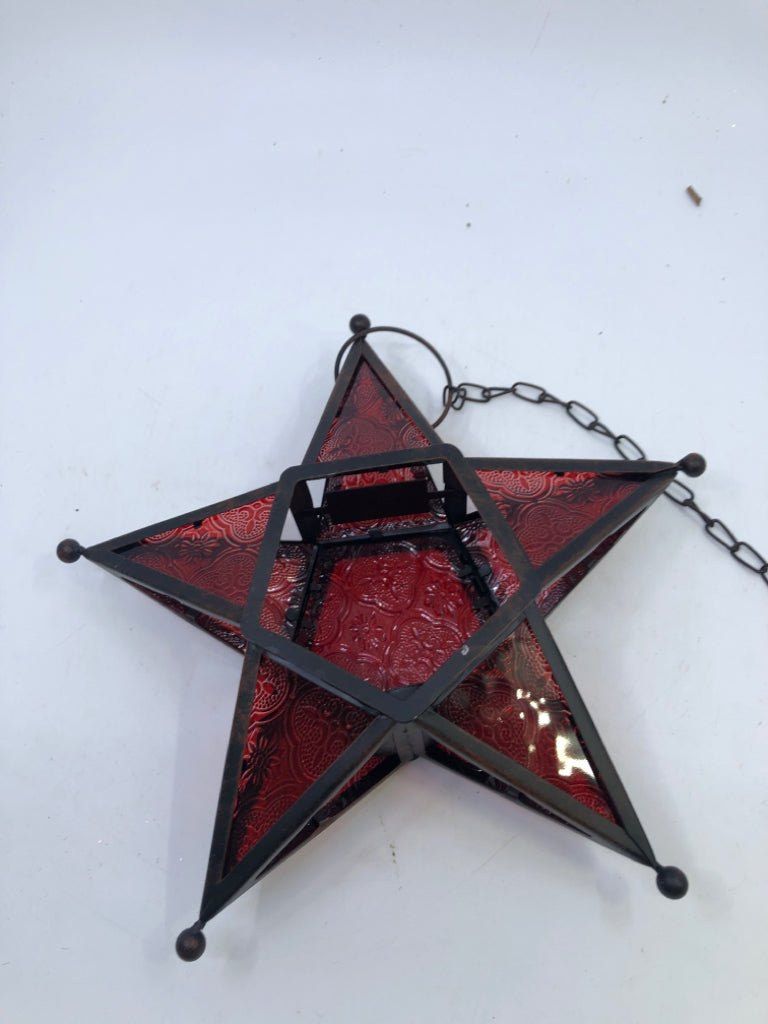 GLASS STAR TEA LIGHT HOLDER.