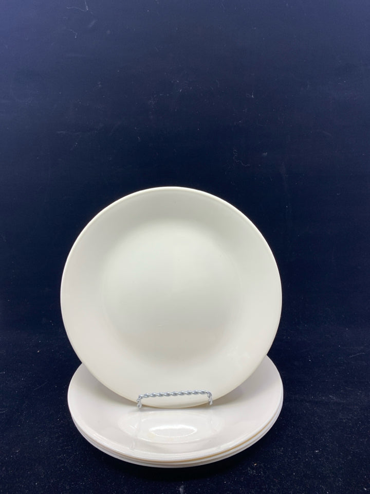 4 TAN CORELLE LUNCH PLATES.