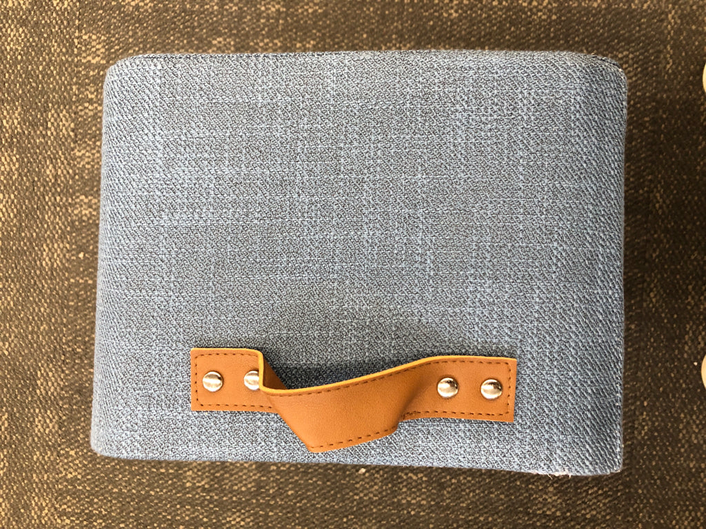 BLUE FABRIC STORAGE BIN W/LEATHER HANDLES.