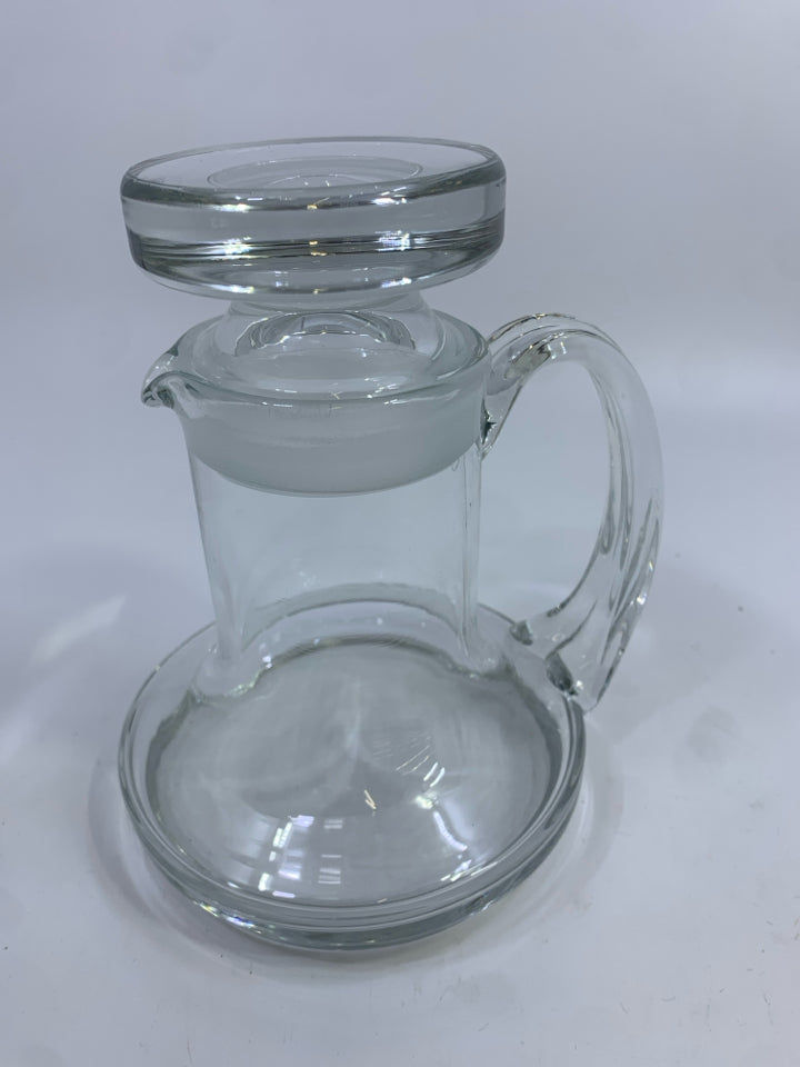 GLASS DECANTER W/HANDLE & FROSTED LID STOPPER.