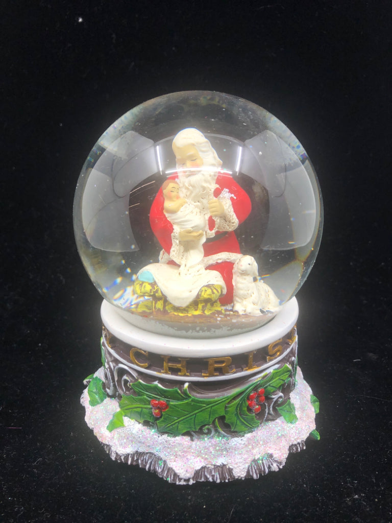 SANTA W INFANT MUSICAL SNOW GLOBE.