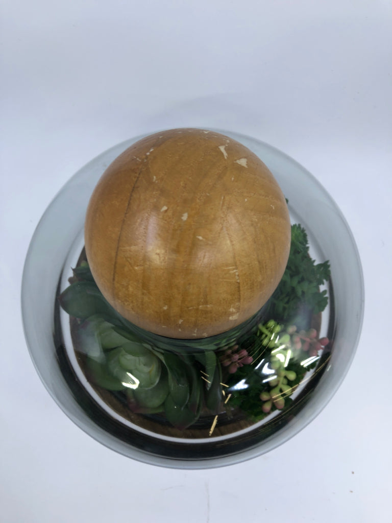 FAUX SUCCULENT TERRARIUM ARRANGEMENT ON WOOD BASE.
