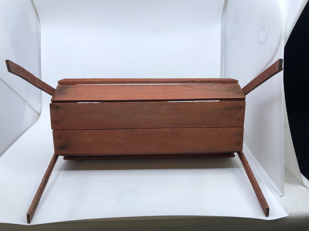 RED FOOTED WOOD PLANTER W HANDLE.