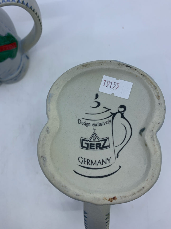 2 HEAVY GERMAN OVERALL MUGS.