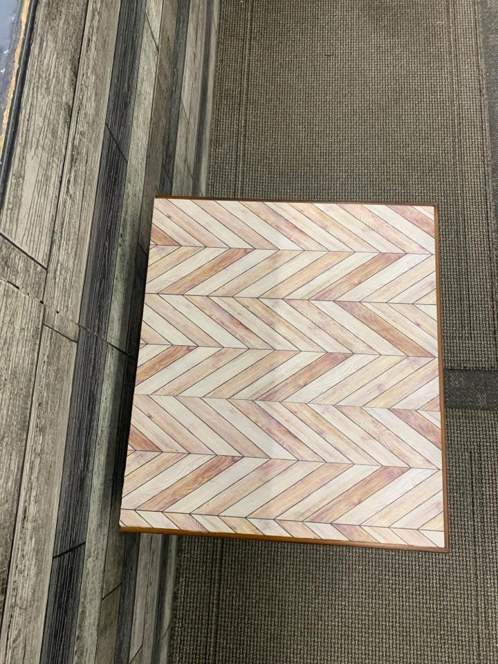 BROWN DRAWER SIDE TABLE W/ FAUX TRIANGLE PATTERN.