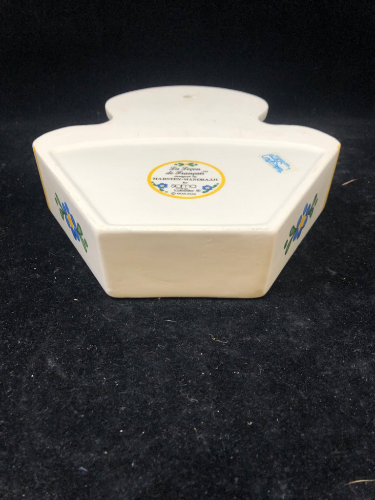 CERAMIC BLUE AND YELLOW COFFEE FILTER HOLDER.