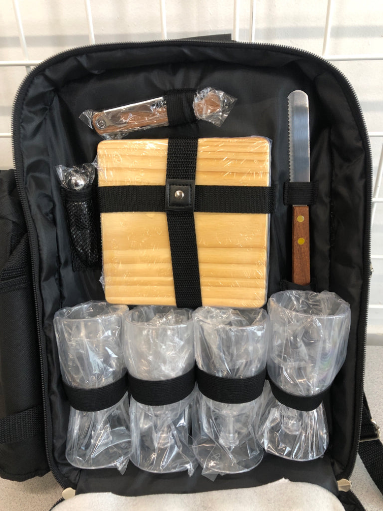 BLACK BACKPACK W/PICNIC UTENSILS, PLATES, CUPS.