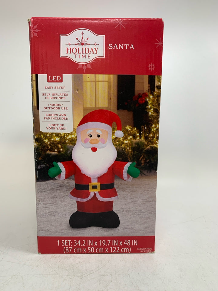 IN BOX HOLIDAY TIME SELF INFLATED SANTA.