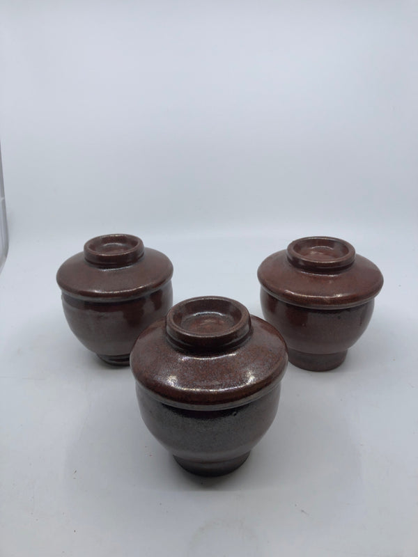 3 BROWN POTS W LIDS.