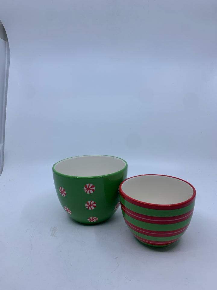 2 GREEN AND RED NESTING BOWLS.