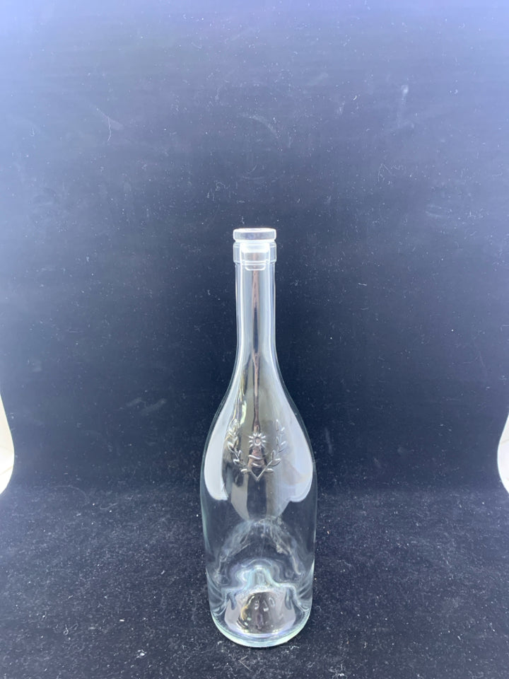 CLEAR GLASS DECANTER W/ EMBOSSED SUN GLASS CORK.